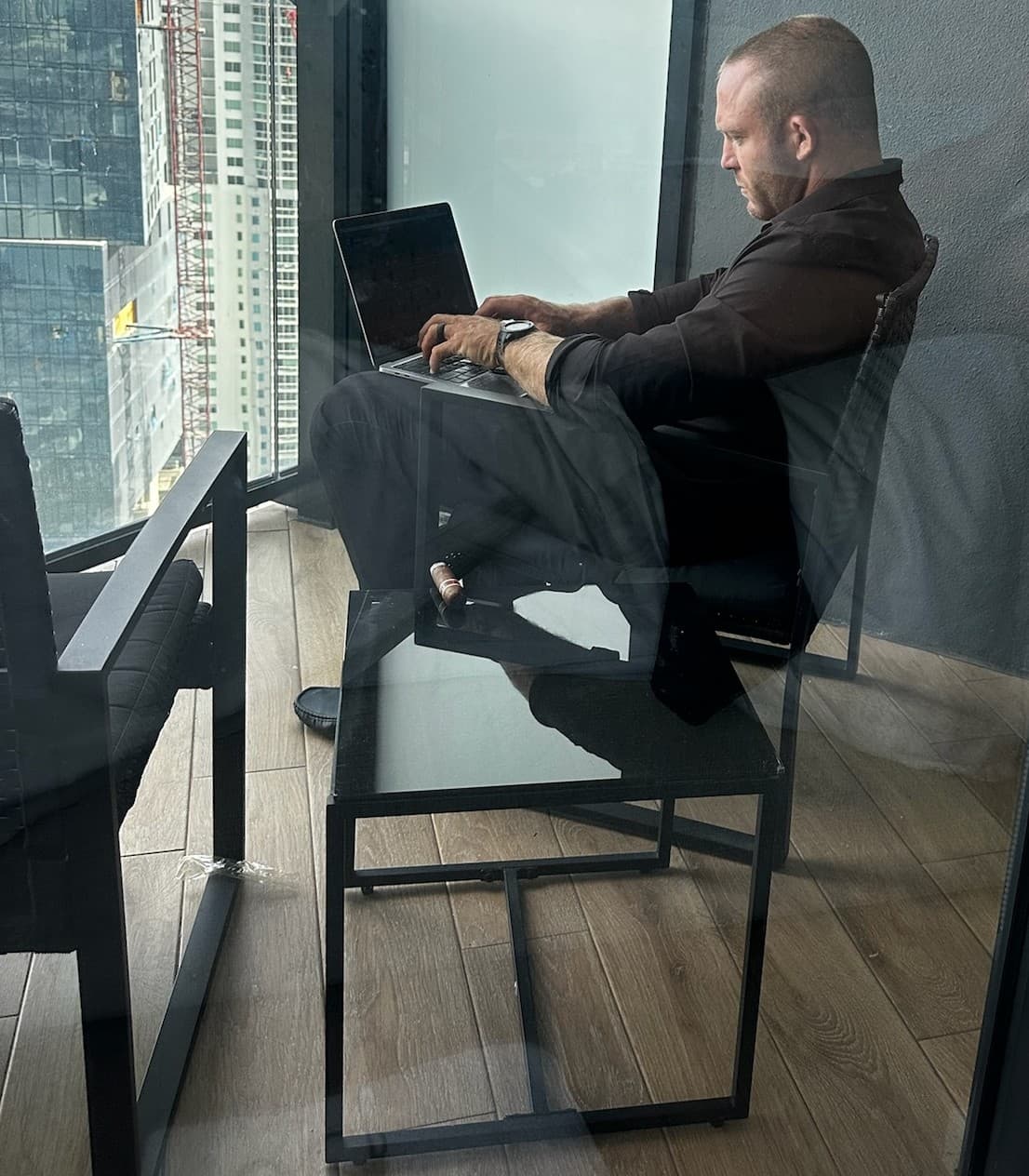 A man working at a laptop