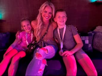 Bethany and two children outdoors