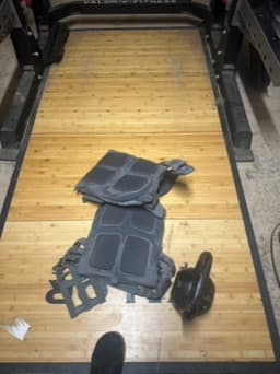 A person doing pull-ups in a home gym